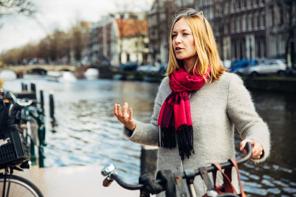 Private Amsterdam Bike Tour with a Local - The Early Stops: West-Indisch Huis and a Hidden Courtyard Feeling