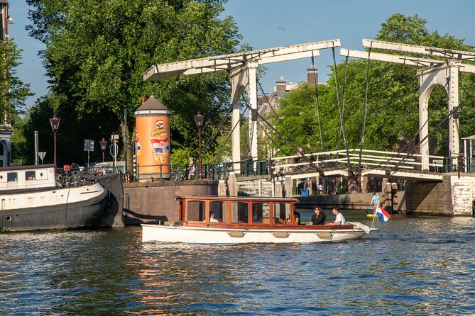 Private Boat Tour Amsterdam - 90 Min incl. welcome drink on historic saloon boat - Why this private Amsterdam saloon boat ride feels special