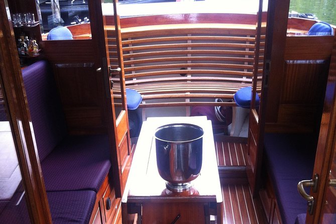 Private boat tour on a electric saloon boat - Price and value: $515.88 for up to 8 people