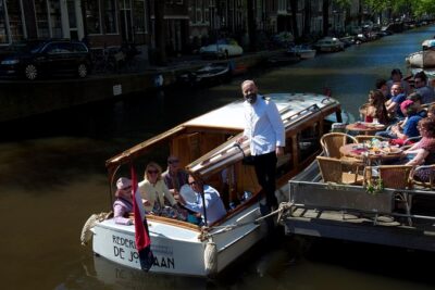Private Champagne Canal Cruise in Amsterdam - Boat comfort and the “semi-open bar” experience