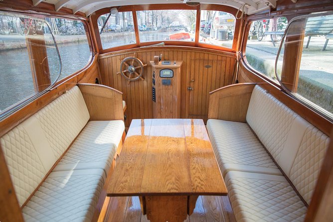 Private Guided Historic Amsterdam Canal Cruise in a Salon Boat - Meeting on Prinsengracht 377: easy start, small “dock-side” reality