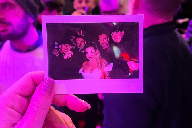 Private Hostess Bar Tour in Amsterdam Red Light District (3h) - De Wallen bar crawl: four bars, free shots, games, and dance shows