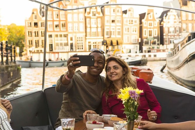 Private Romantic Canal Cruise Amsterdam with Bubbly and Snacks - UNESCO canal belt views: from 16th-century grandeur to everyday life