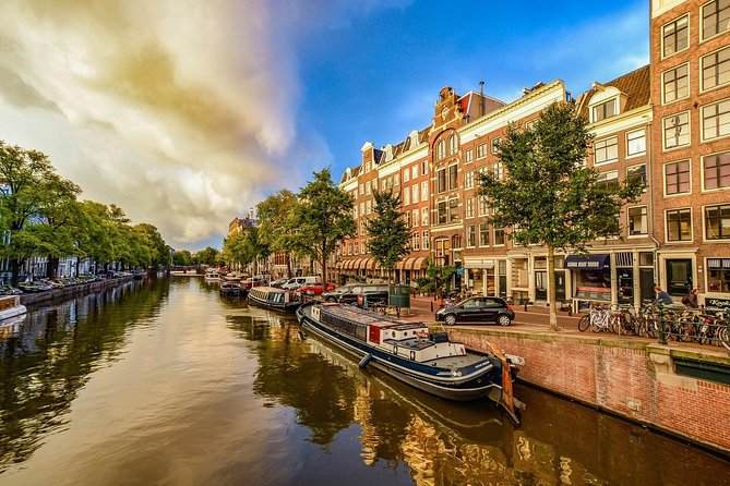 Private Tour: Amsterdam's City Highlights and Hidden Gems - Magere Brug and the Amstel River: Closing the Loop with Water