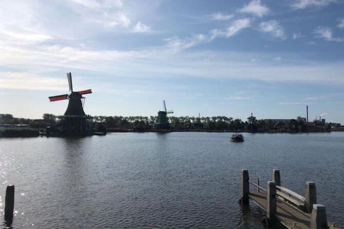 Private Tour to Tulips, Keukenhof, Windmills & Cheese Farm - Zaanse Schans windmills: wooden shoes, one windmill entry, and craft-shop time