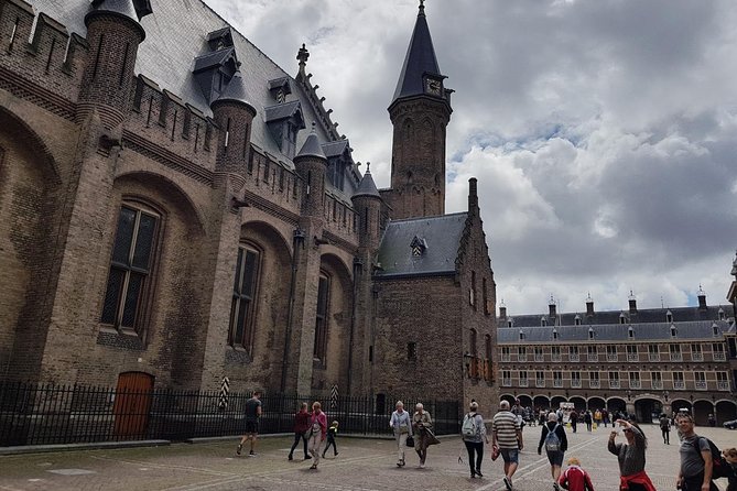 privatetour Delft, The Hague&Rotterdam Kinderdijk from Amsterdam - Koninginnenhoofd and Hotel New York: maritime history with a river view