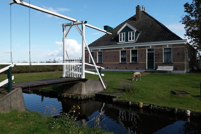 Small-Group Guided Sunset Canoe Tour in Waterland with Dinner - Stop for dinner: the lake picnic with windmills in view
