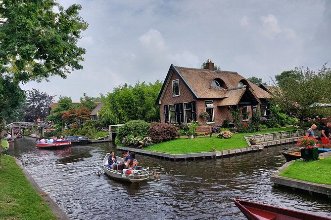 Small-Group Tour to Windmills & Giethoorn with boat tour - Zaanse Schans windmills: museums, wooden shoes, and that cheese taste