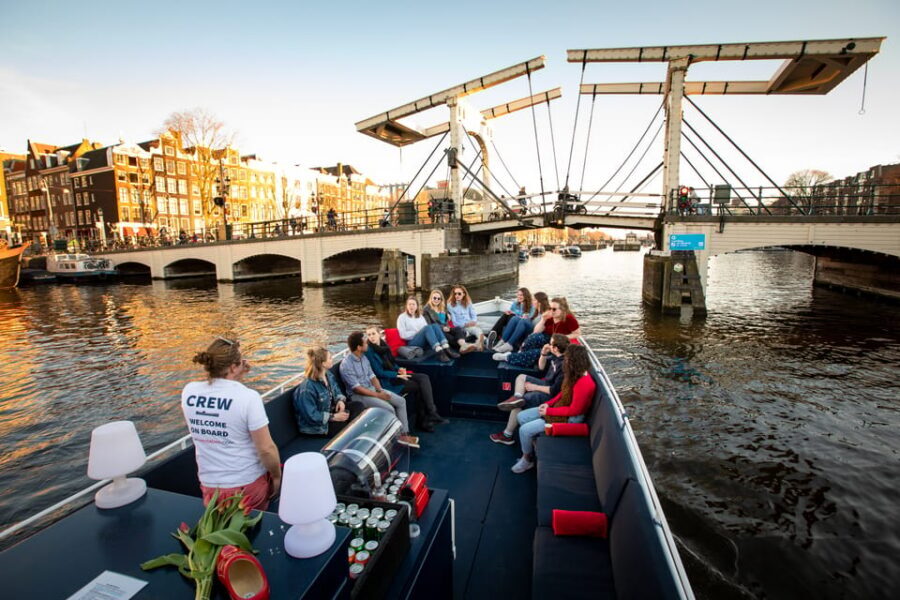 Small-Group Walking Tour with Amsterdam Canal Cruise - The canal cruise: 1 hour, Amstel views, seven bridges