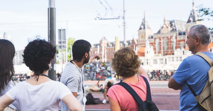 Small-Group Walking Tour with Amsterdam Canal Cruise - Beursplein to Dam Square: getting your bearings fast