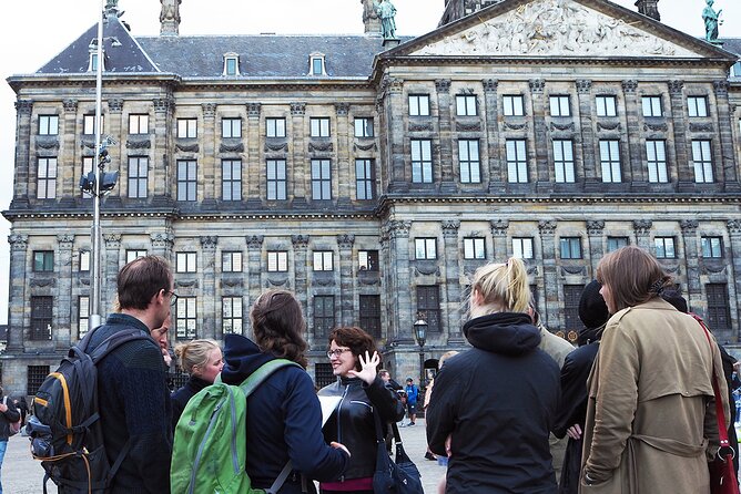 Small-Group Women's History Tour in Amsterdam - Dam Square: Busy Public Space and a Tasteful Dose of Scandal