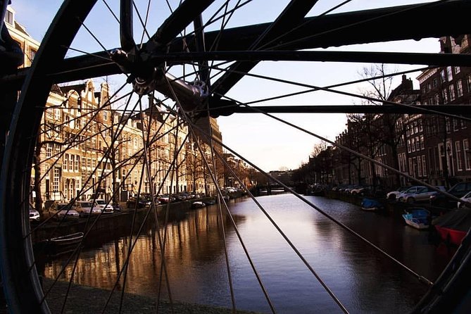 Urban Adventures Amsterdam Bike Tour, Graffiti and Magnet Fishing - The Jordaan alleys and Pontsteiger ferry views