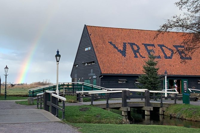 Visit Amsterdam Countryside with windmills by bike - Zaanse Schans: Mills, Wooden Houses, Clogs, and Cheese