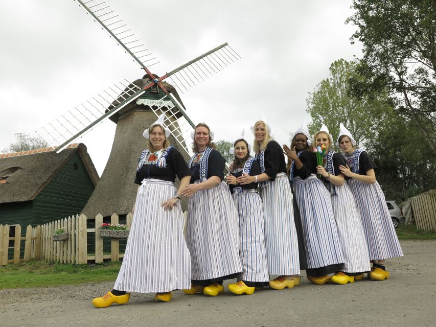 Volendam: Traditional Costume Photo with Cheese & Clog Tour - Clogs Up Close: Seeing Wood Become Footwear