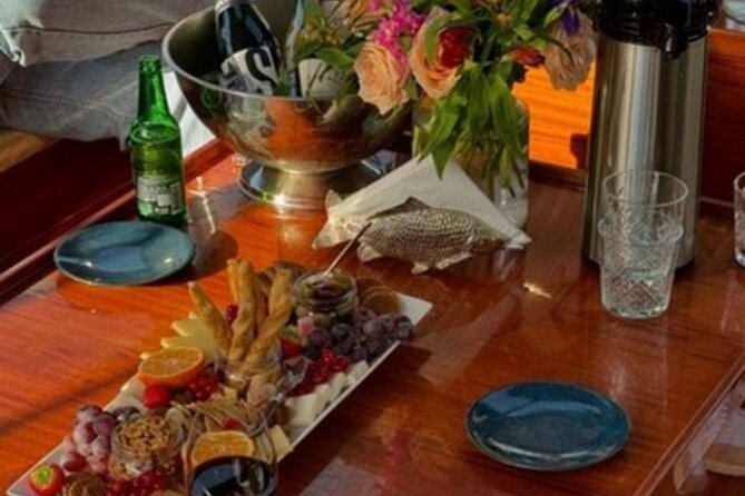 Winter Canal Cruise in Amsterdam - Electric boat comfort: heated seating, blankets, and covered canals